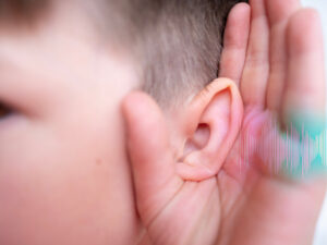 Close-up detail young male ear, sound wave, poor hearing, Ear Di